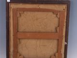 an old picture of a wooden frame with a painting in it