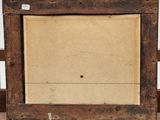 an old picture frame sitting on top of a wooden table