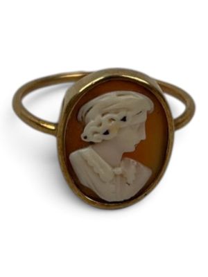 an image of a ring with a picture of a woman wearing a headdress