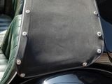 a black bag sitting on the back of a motorcycle
