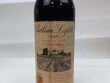 a bottle of wine that is sitting on a table