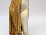 an image of a statue of a woman holding a vase