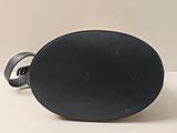 a black purse that is sitting on a table