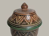 an image of a decorative bowl with a lid