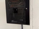 a black box with wires and wires attached to it