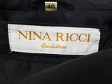 a close up of a label on a black jacket