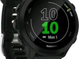 a close up of a smart watch on a white surface
