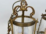 two lamps that are sitting next to each other on a table