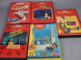 four children ' s books that are on a table