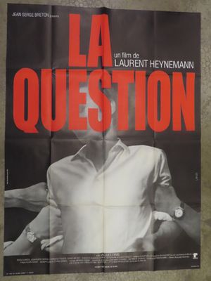a poster of a man in a white shirt is on a wall