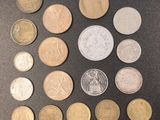 a lot of coins that are on the table