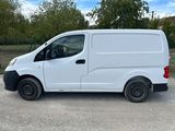 a picture of a white van parked in a parking lot