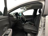 the interior of a car with the door open and the driver ' s seat down