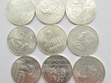 six different types of indian coins on a white surface