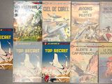 un grand nombre de livres posés sur une table