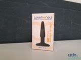 a box of lovehoney vibrating device on a table