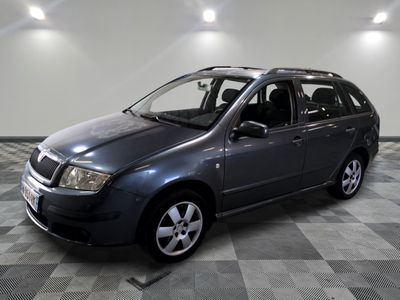 a picture of a car that is parked in a garage