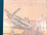 a book with a picture of a military plane on it