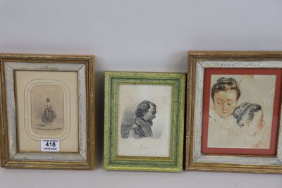 three framed pictures of a woman and a child on a shelf