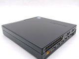 a black laptop sitting on top of a white table