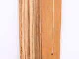 a piece of wood that has been cut and is laying on the floor