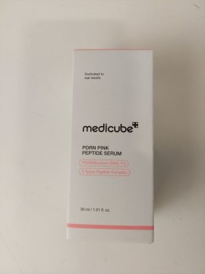 a close up of a box of medicine on a white surface