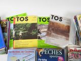a lot of books that are sitting on a table