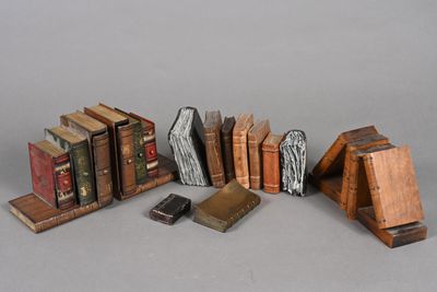 a lot of books that are sitting on a table