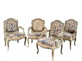 set of four french louis xv style painted armchairs with floral upholstered upholstered cushions
