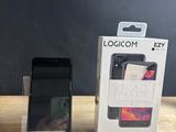 a box with a phone inside of it sitting on a table