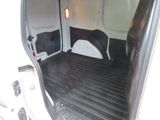 a white van with the door open and the bed in the back