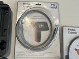 a picture of a cell phone with a cord attached to it