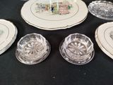 a table with a bunch of plates and bowls on it