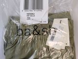 a bag of clothing that has a barcode on it