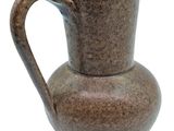 a brown vase with a handle on a white background
