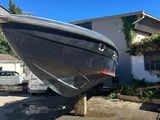 an image of a boat sitting on top of a trailer
