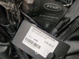 a label on a jacket that says it ' s not for sale