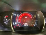 a close up of a car dashboard with a speedometer