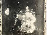 an old black and white photo of a large explosion of smoke