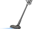 a close up of a cordless vacuum cleaner on a white background