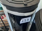 a black trash can with a black lid and a number on it
