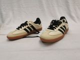 vintage adidas sneakers in white and black with gum soles