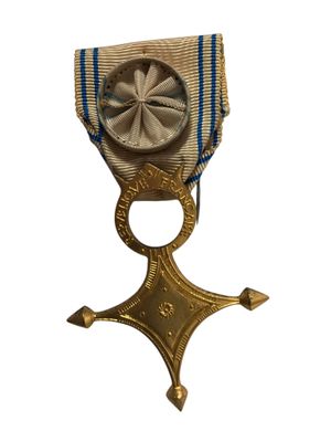 l'image d'une médaille portant une étoile