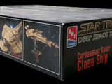 a box of star trek action figures on a black background
