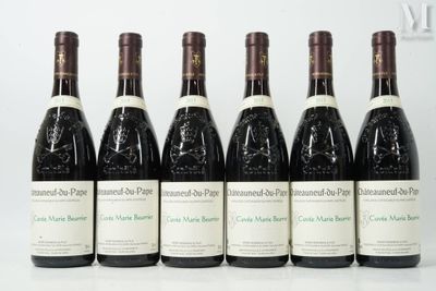 six bottles of wine are lined up in a row on a table