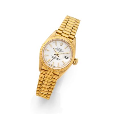 rolex a lady ' s 18ct gold automatic calendar wristwatch