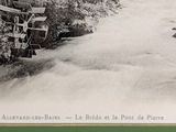 a picture of an old picture of a river running through a forest