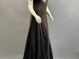 an image of a black and white dress on a mannequin mannequin