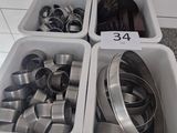 two bins filled with different types of metal items