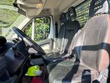 an image of the inside of a van with the driver ' s seat up